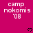 A static image with a bright pink background displaying repeated text 'camp nokomis '08' and small black heart symbols.