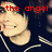 A pixelated image of a person in a dark blue shirt with white stripes, overlaid with red text reading "the angel from my nightmare".