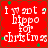 Red background with white text reading 'i want a hippo for christmas' and scattered green star shapes, arranged in four identical quadrants.