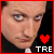 A 3x3 contact sheet of an animated AIM buddy icon showing a man's face with changing expressions and heart symbols, each frame containing the text "TRE" below a pixelated red heart.