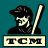 Pixelated cartoon figure in dark cap and shirt holding baseball bat, standing against teal background with 'TCM' text below.