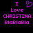 Pixelated text and symbols in pink and purple on black background, with a heart symbol above 'Love' on the left side.