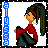 Pixel art of a character with long dark hair in a ponytail, wearing red top and blue pants, standing beside vertical blue text on white background.