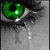 Green eye with tears, text about beauty behind a mask, green mask, and green smoke with text about not getting burned.