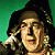Pixelated image of a character with long hair and a hat on the left, next to green text reading "Original Icons .com" on a dark green background.