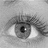 A grayscale close-up of a human eye with animated pink text and heart symbols appearing in different positions across frames.