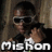 A pixelated figure wearing dark sunglasses and a black jacket over a white shirt, with one hand raised near the face, displayed with the text 'Mishon' below.