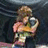 A pixelated image shows a person holding another person in an embrace against a dark background, with pink text reading "don't leave me." on the right side.