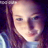 nine identical images showing a person with long brown hair wearing a light blue striped shirt, each overlaid with 'too cute' text in the top-left corner
