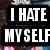 Black background with white pixelated text reading "I HATE MY SELF" in two lines, visible text partially obscured by pixelation.
