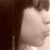A sepia-toned animated sequence showing a person's face in profile with subtle mouth and eye movements