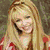 six pixelated images showing a person with long hair in various poses and outfits, including red top, white dress, and blue background