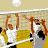 Animated volleyball game contact sheet showing multiple frames of players jumping to hit a ball over the net with yellow court background and gray player silhouettes.
