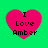 Four identical pink hearts on green background with black text "I Love Amber" inside each heart.