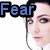 A pixelated image of a person with dark hair and blue eyes, showing text fragments 'Fear', 'is only in our minds'