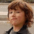 Pixelated image of a person with brown hair and dark clothing on left, red background with white text reading "Frank the tank" above and "Bonus Jonas He Knows He owns" below.