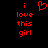 Red pixelated text 'i love this girl' on black background with a red heart symbol above the text.
