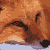 Pixelated image of a brown dog with black markings on its face and legs, standing against an orange-brown background with light blue at the bottom.