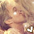 Animated contact sheet showing two frames of a cartoon character with blonde hair and closed eyes, each frame featuring a different colored checkmark symbol below the character's face.