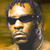 A 2x2 contact sheet of a pixelated animated icon featuring a person with dreadlocks and sunglasses, alongside the text "CoolDude.com" on a blue background in one frame.