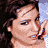 A 4-frame contact sheet of a pixelated animated icon featuring a woman with long brown hair in various poses, including close-up and side views, with visible text "Coolbuddy.com" on one frame.