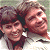 A contact sheet of two pixelated frames showing a smiling couple on the left and green text reading "Original Icons .com" on the right against a dark background.