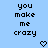 Pixelated text reads 'you make me crazy' in two identical vertical on a light blue background with small heart symbols below each