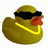 A yellow rubber duck wearing black sunglasses and a thick gold chain, positioned next to the word 'GANGSTA' in pixelated yellow text on a black background.