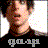 A pixelated image of a person with dark hair wearing a black shirt, featuring the text "gasp" in stylized font across the chest.