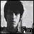 Four- of grayscale images showing a person with dark hair and light clothing, each containing the text "Fan" in pixelated font