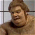Pixelated static image of a person with light brown hair and neutral expression against a grid-patterned background, likely from an Austin Powers movie reference.