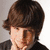 A pixelated image of a person with brown hair and dark clothing, next to blue text on green background reading 'I<3 Josh Hutcherson' in two