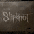 A static image with four quadrants: top-left shows 'Slipknot' text on a textured background, top-right features a glowing blue heart outline around a small figure, bottom-left displays 'Th-Metal-Love' text on black, and bottom-right is empty gray.