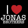 Black background with white text 'I' and 'JONAS BROTHERS' and a red heart symbol replacing 'love' between them.