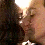 A split-screen image shows two people kissing on the left and a person in a blue shirt on the right, with text reading "Clocke It To Me!" on a gradient background.