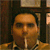 A person in a brown jacket with a white collar exhales smoke while holding a cigarette, viewed against a dark wooden background with framed