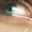 A pixelated eye with a blue-green iris and brown eyelid, next to text reading 'IF YOU LOOKED INSIDE THIS GIRL, YOU'D SEE HOW HARD IT IS FOR HER TO STAY STRONG WHEN EVERYTHING GOES...' above a broken red heart symbol.