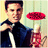 Pixelated image of a person in a dark jacket holding a red circular object against a light background.