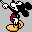 Pixelated character with large black ears, white face and hands, red shorts, yellow shoes, one arm raised in a checkered pattern against gray background.