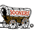 Pixelated image of a brown and gray vehicle with red text on its side, featuring visible wheels and a small circular object nearby.