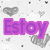 Pixelated text reads 'Estoy Enamorado De Ti' over a white background with gray heart shapes and scattered black dots.
