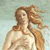 A pixelated figure with long flowing brown hair, wearing a white garment, set against a light blue background with subtle gradient.