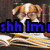 Pixelated image of a dog with light brown and white fur, blue text reading "shh lm" in blocky font over the lower portion.