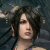 Static pixelated image of a person with dark hair against a blurred background, wearing light-colored clothing with visible straps.