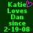 Green pixelated text on dark green background reads 'Katie Loves Dan since 2-19-08' with a pink heart symbol replacing the letter O in Katie.