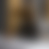 A pixelated gradient image with no discernible subjects or objects, featuring smooth transitions between brown, gray, and white tones.