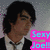 Pixelated image of a person with dark hair wearing a white shirt and black jacket, next to bright pink text reading 'Sexy Joel' in blue letters.