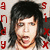 Pixelated image of a person with dark hair and light skin, red text on left and right sides.