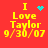 Red background with yellow text reading "I Love Taylor 9/30/07" and four distinct cyan pixel clusters in different positions.