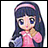 A pixelated anime-style character with long dark hair and a pink headband, wearing a pink top with blue accents, positioned next to stylized text on a black background.